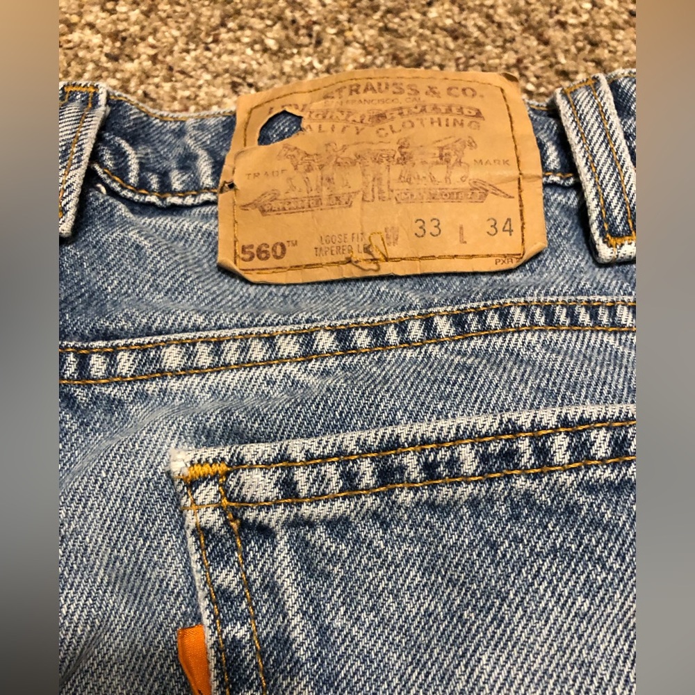 Vintage 560 loose tapered Orange tab Levi’s blue jeans 32x32 made in USA 90s